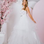 G259 Strapless Debutante Gown has Ruffles on the skirt