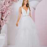 G271 A fun ruffle skirt with layers of tulle and silver beaded belt at the waist