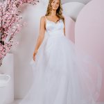 G282 A strappy satin bodice is paired with a frilled tulle skirt