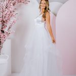 G282 A strappy satin bodice is paired with a frilled tulle skirt