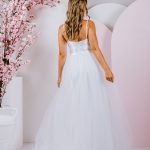 G288 Gorgeous A-line silhouette with a sweet bow at the waist and tulle skirt