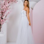G288 Gorgeous A-line silhouette with a sweet bow at the waist and tulle skirt