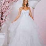 G292 Delicate ruffles compose the skirt of this spaghetti strapped ballgown