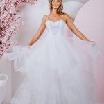 G292 Delicate ruffles compose the skirt of this spaghetti strapped ballgown