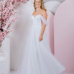 G302L LINED Dreamy soft draped sleeves with elegant, pleated tulle bodice with exposed boning