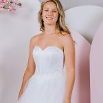 G305 Sweetheart neckline with exposed boning as the feature and tulle ballgown